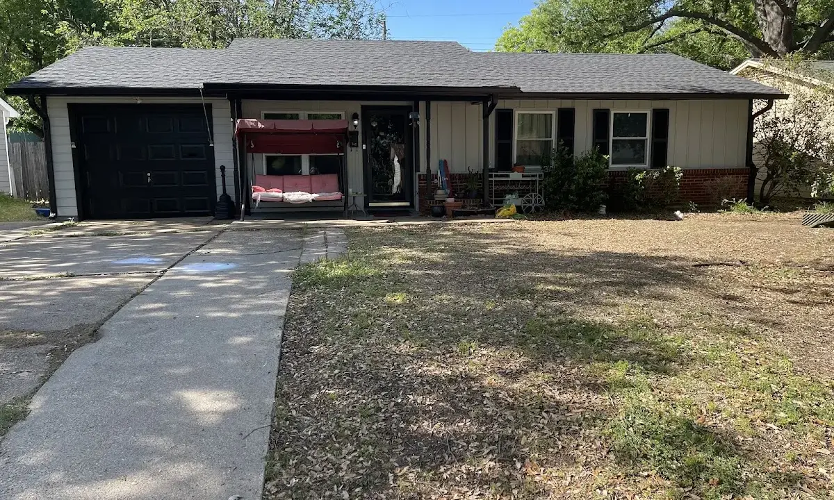 Asphalt Shingle Roof Repair crew at work on a residential roof in Garnet
